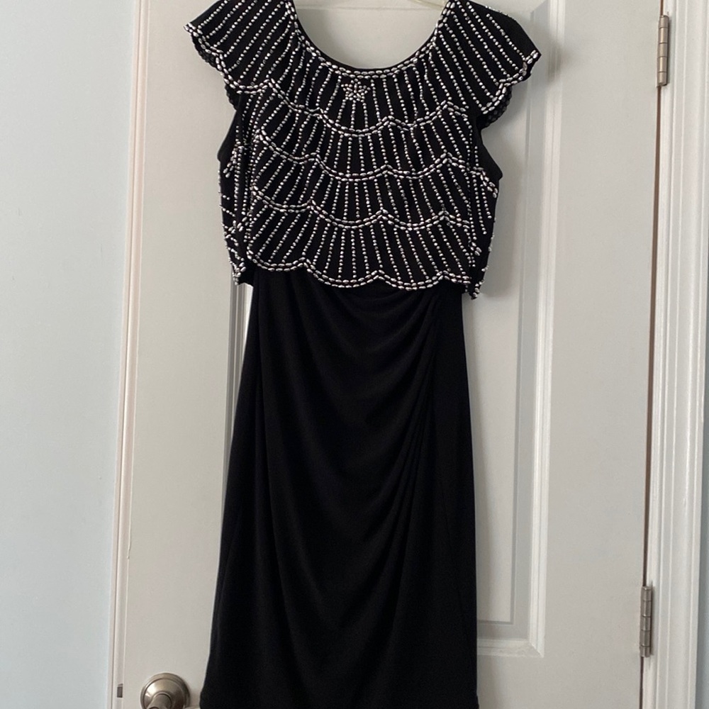 Xscape black/beaded knee length cocktail dress.